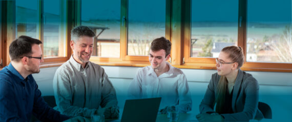 Four people in a meeting situation